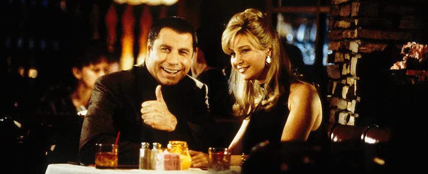 Russ (John Travolta, left) and Crystal (Lisa Kudrow) try to pull off the scam of all scams in 'Lucky Numbers'.