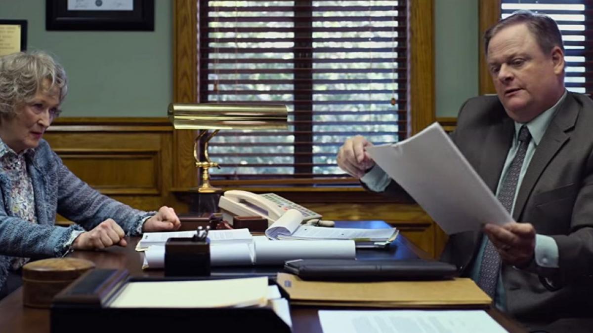 Ellen Martin (Meryl Streep) and her lawyer (Larry Clarke) are one a paper chase in Steven Soderbergh's The Laundromat.