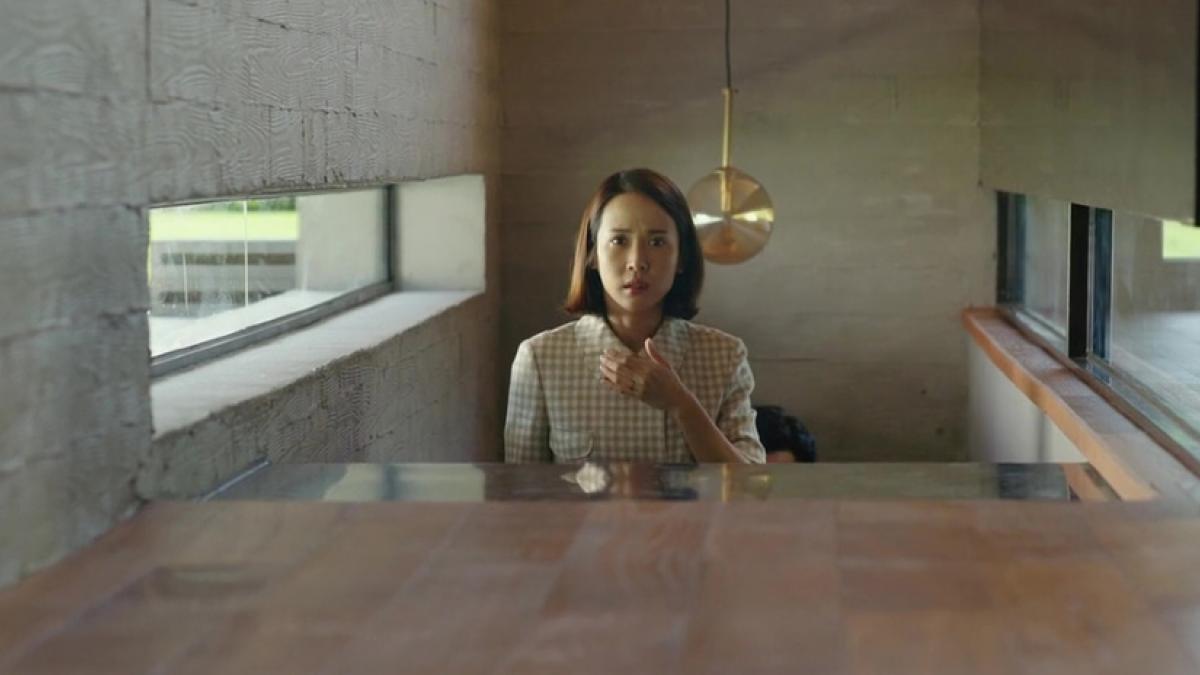 Mrs. Park (Jo Yeo-jeong) has more than one intruder in her home in Bong Joon Ho's Parasite.