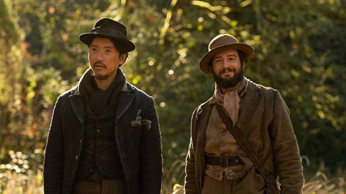 King Lu (Orion Lee, left) and Cookie Figowitz (John Magaro) forge a friendship over biscuits in Kelly Reichardt's 'First Cow'.