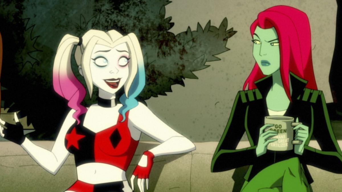 A cartoon image of a white-skinned woman in pigtails and red-and-black roller-derby outfit sitting next to a green-skinned, red-haired woman in black jacket.